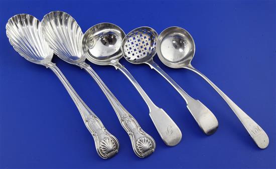 A pair of Victorian silver serving spoons, sifter spoon and 2 ladles
